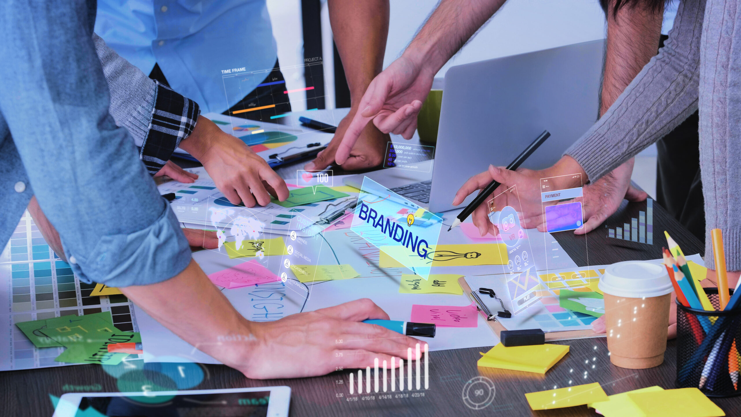 Close up creative designer use augmented reality app brainstormi Close up creative designer use augmented reality app brainstorming about branding on desk at modern office.Creative digital development agency
